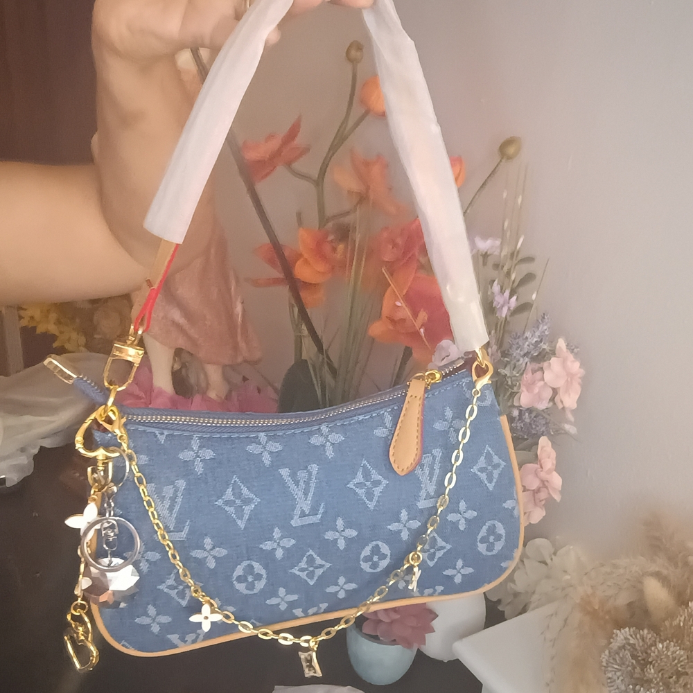 Stylish Blue Crossbody Bag with Gold Details